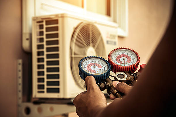 Professional Heat Pump Repair technician working in Lake City, SC